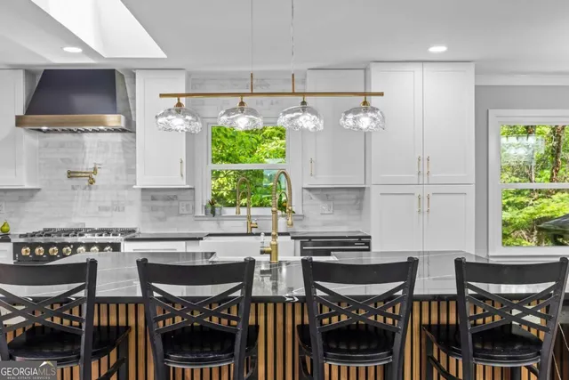 a kitchen with a sink and a window