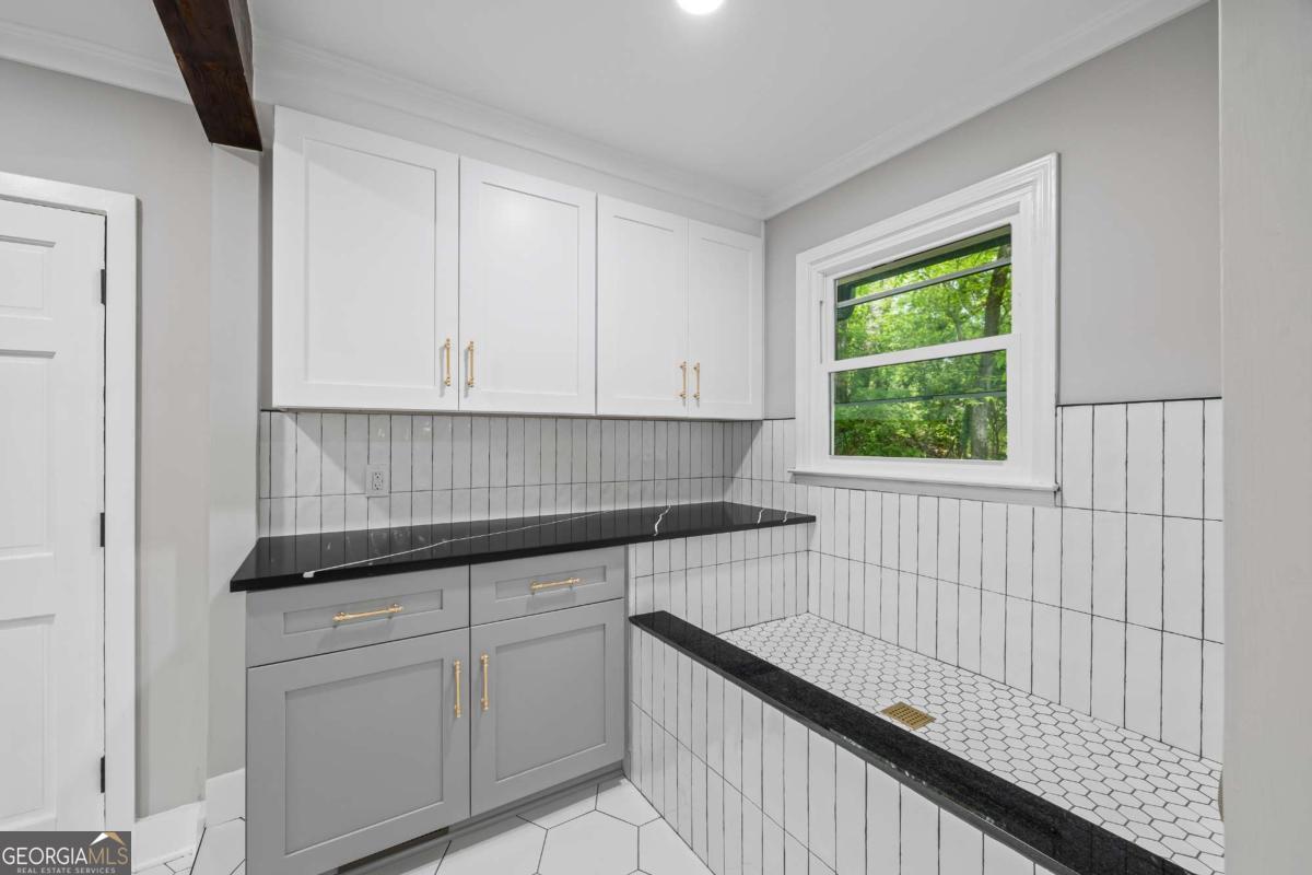125 Terrell Drive Athens, GA 30606 - Photo 29 of 75 a kitchen with a sink and cabinets