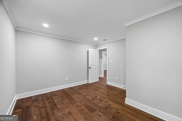 a view of an empty room with a balcony