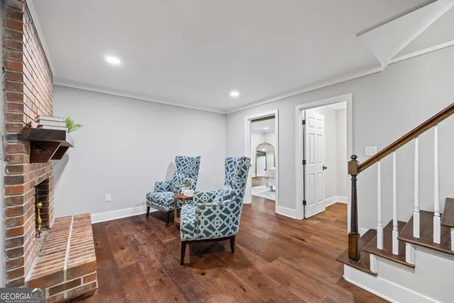 a front view of a house with a yard table and chairs