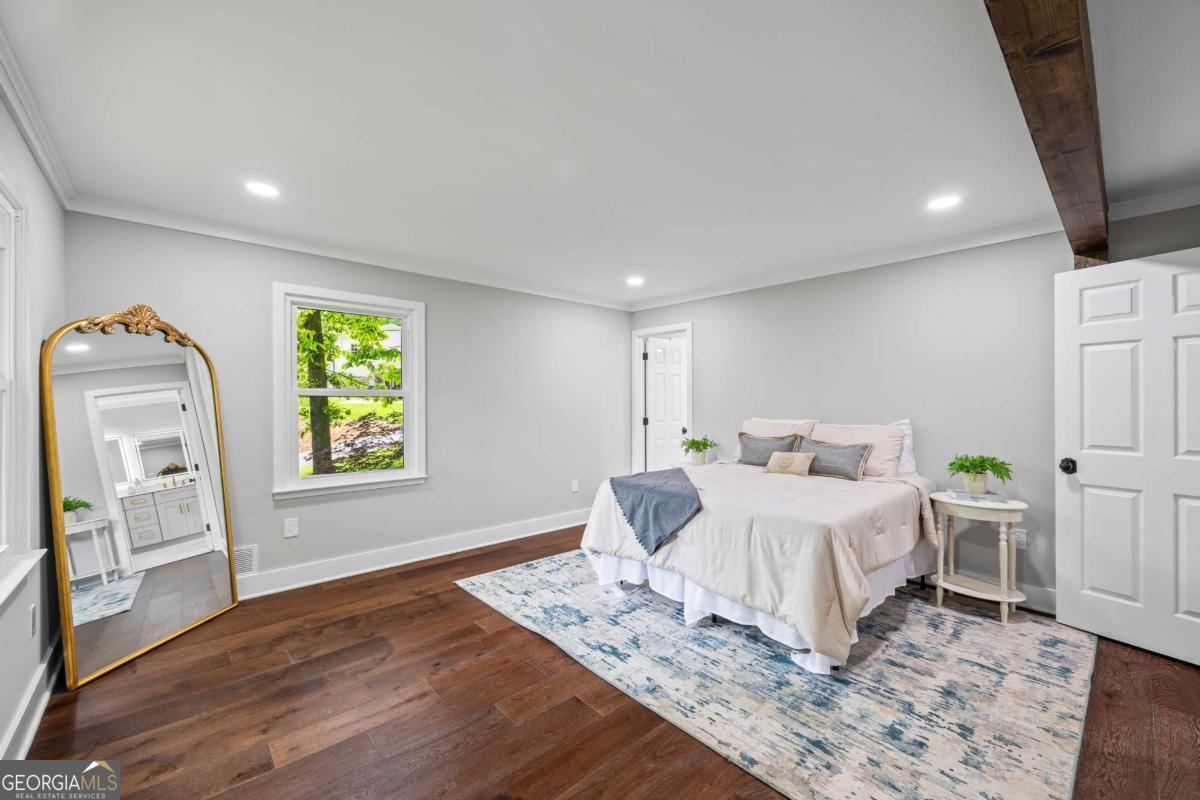 125 Terrell Drive Athens, GA 30606 - Photo 51 of 75 a bedroom with a bed and a window