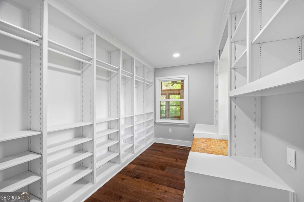 125 Terrell Drive Athens, GA 30606 - Photo 54 of 75 a view of walk in closet with empty racks