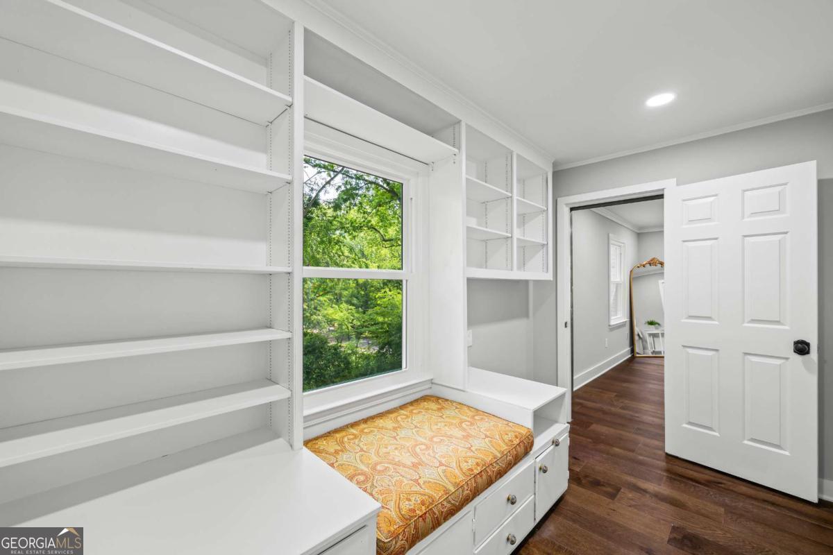 125 Terrell Drive Athens, GA 30606 - Photo 55 of 75 a view of an empty room with wooden floor and a window