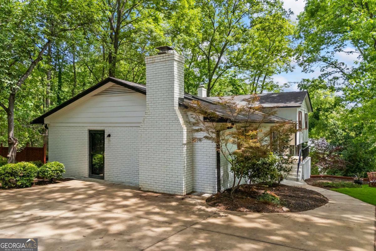125 Terrell Drive Athens, GA 30606 - Photo 71 of 75 a view of a house with backyard and trees