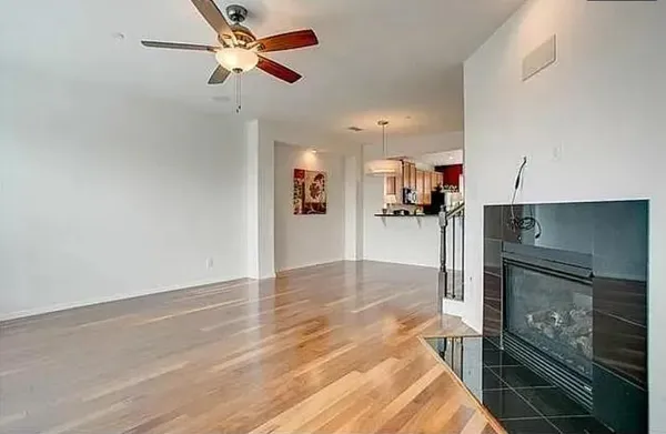 a view of a kitchen and a stove top oven