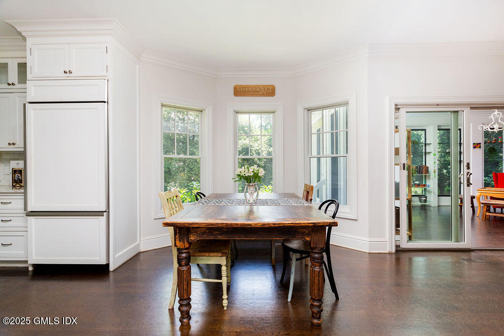 3 Elizabeth Lane Riverside, CT 06878 - Photo 13 of 39 a view of a dining room with furniture window and wooden floor