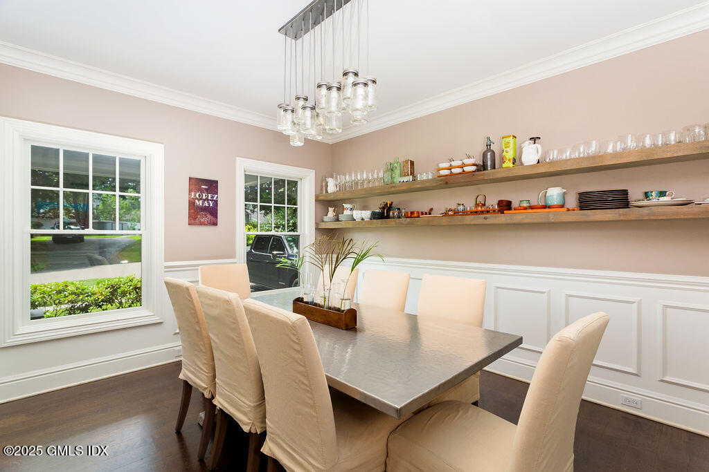 3 Elizabeth Lane Riverside, CT 06878 - Photo 16 of 39 a view of a dining room with furniture a chandelier and wooden floor