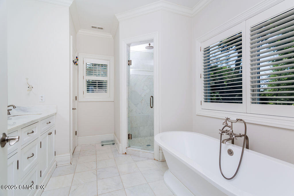 3 Elizabeth Lane Riverside, CT 06878 - Photo 20 of 39 a bathroom with a granite countertop sink a toilet and shower