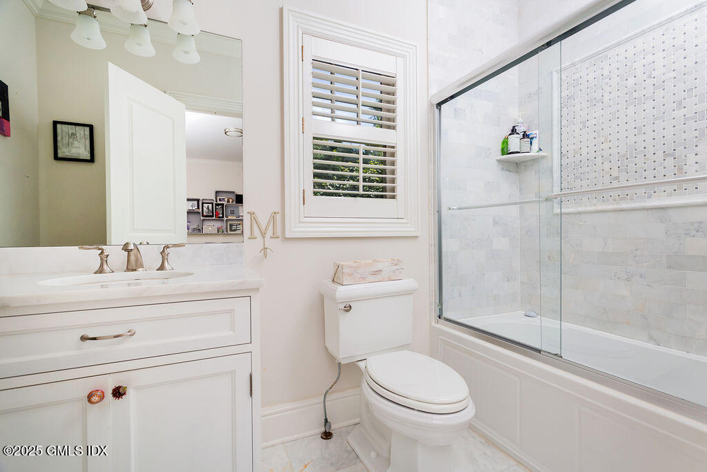 3 Elizabeth Lane Riverside, CT 06878 - Photo 22 of 39 a bathroom with a sink a toilet and shower