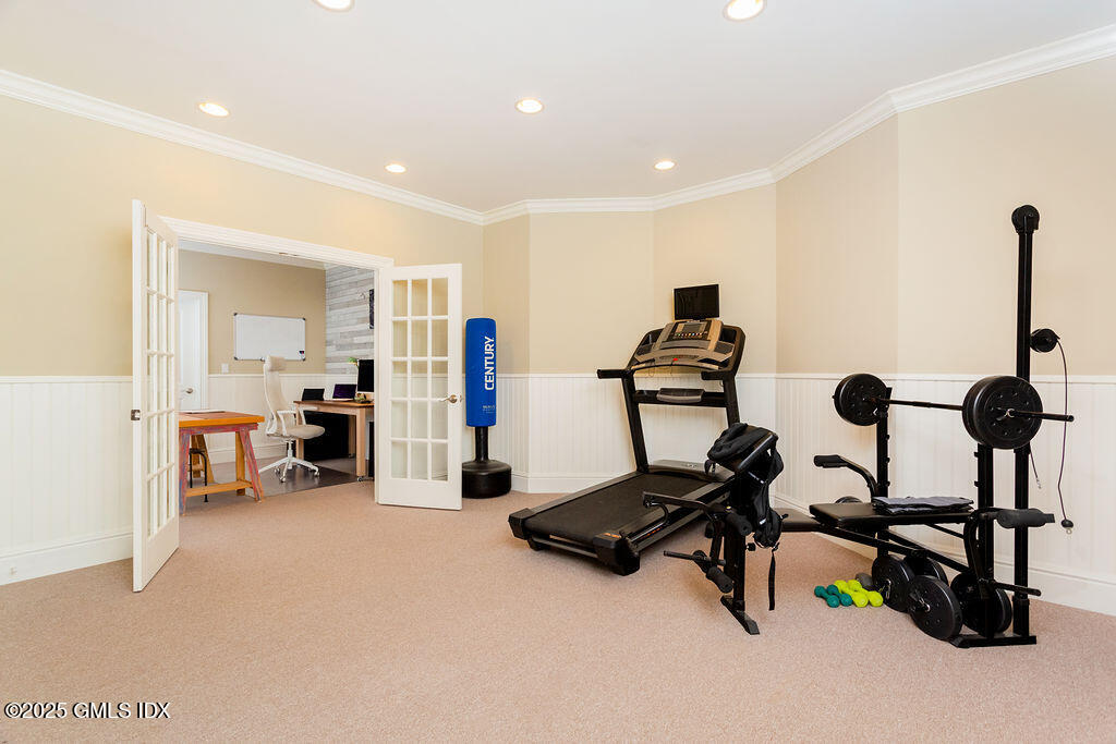 3 Elizabeth Lane Riverside, CT 06878 - Photo 27 of 39 a view of a room with gym equipment