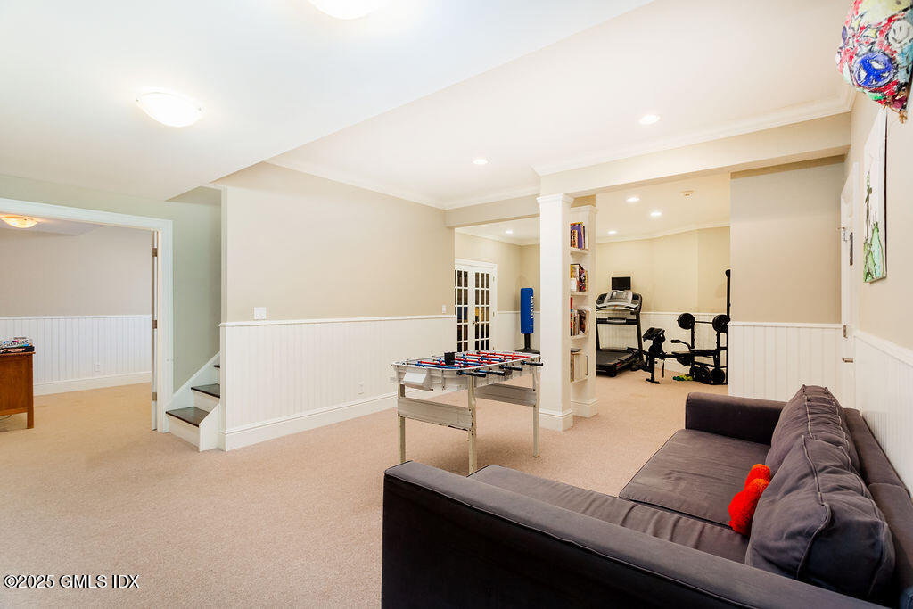 3 Elizabeth Lane Riverside, CT 06878 - Photo 29 of 39 a living room with furniture and view of kitchen
