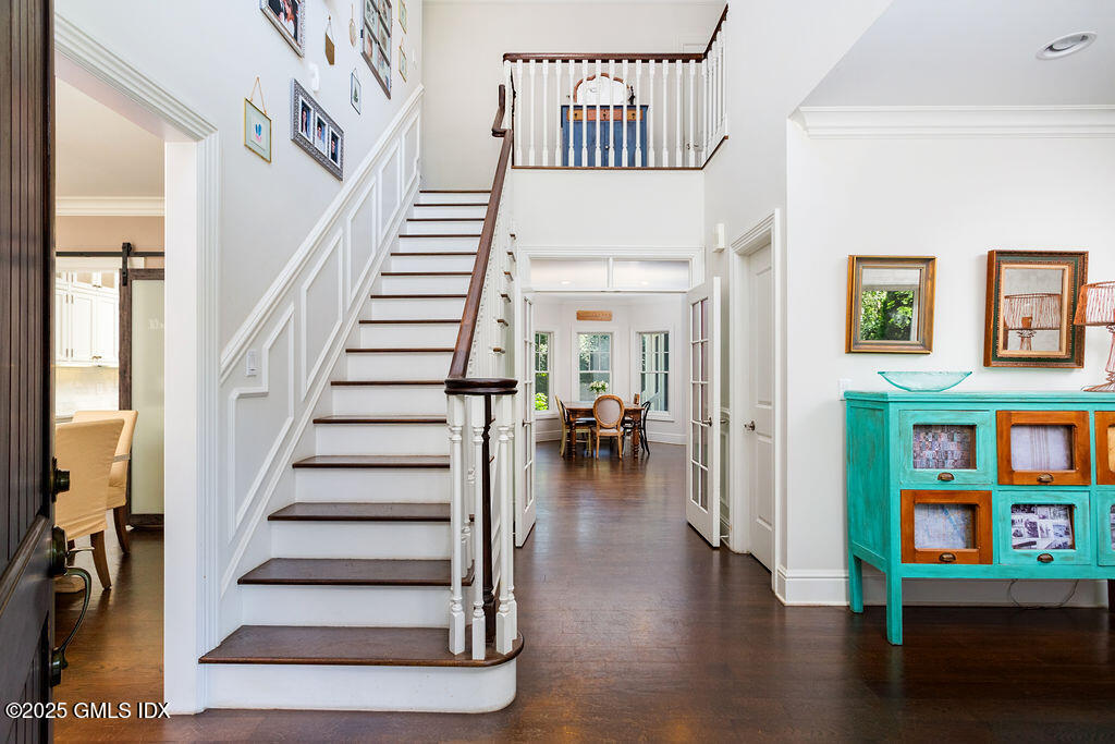3 Elizabeth Lane Riverside, CT 06878 - Photo 4 of 39 a view of entryway and hall with wooden floor