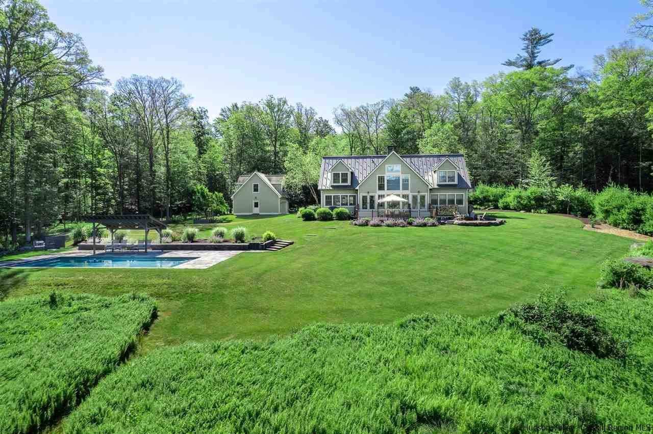 311 Buck Road Stone Ridge, NY 12484 - Photo 4 of 35 a view of a park with large trees and plants