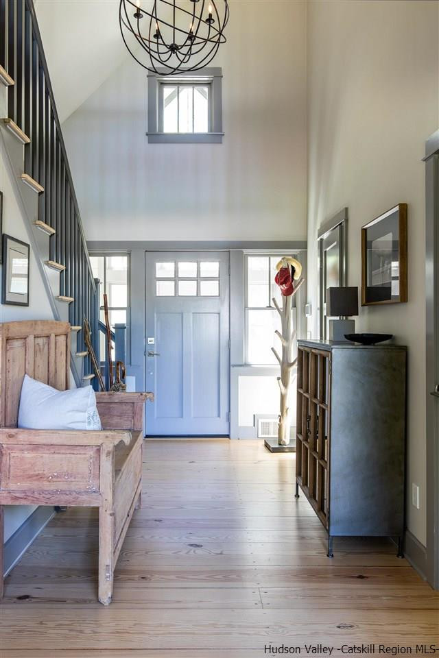 311 Buck Road Stone Ridge, NY 12484 - Photo 6 of 35 a living room with furniture and wooden floor