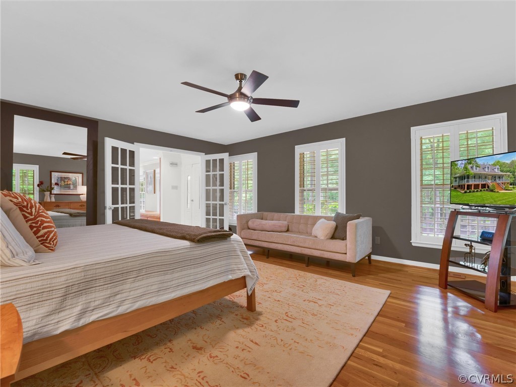 22341 Skinquarter Road Moseley, VA 23120 - Photo 12 of 50 a bedroom with a bed furniture and a large window