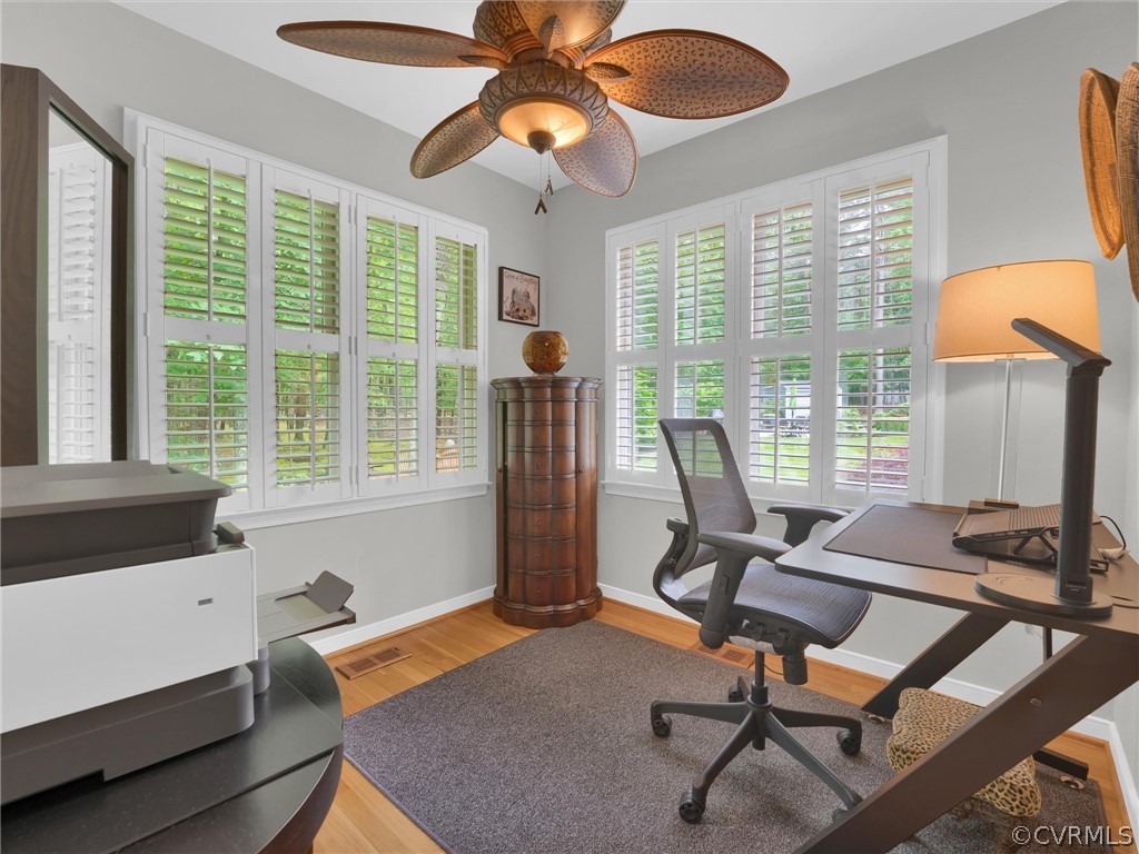 22341 Skinquarter Road Moseley, VA 23120 - Photo 19 of 50 a view of a workspace with furniture and a window