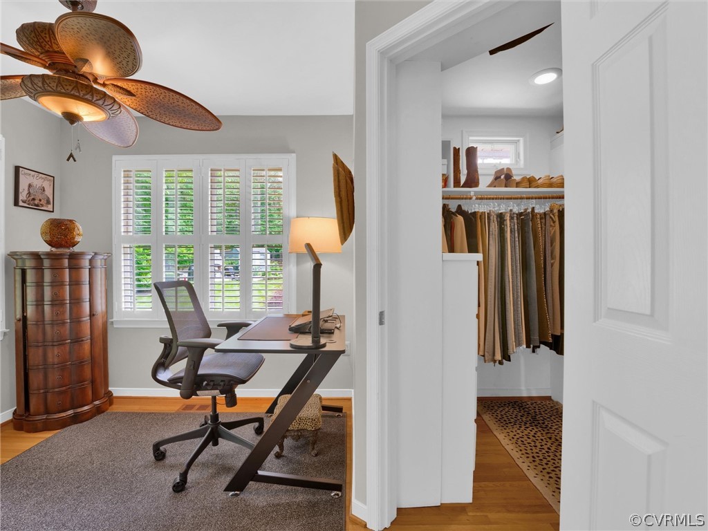 22341 Skinquarter Road Moseley, VA 23120 - Photo 20 of 50 a view of a workspace with furniture and a window