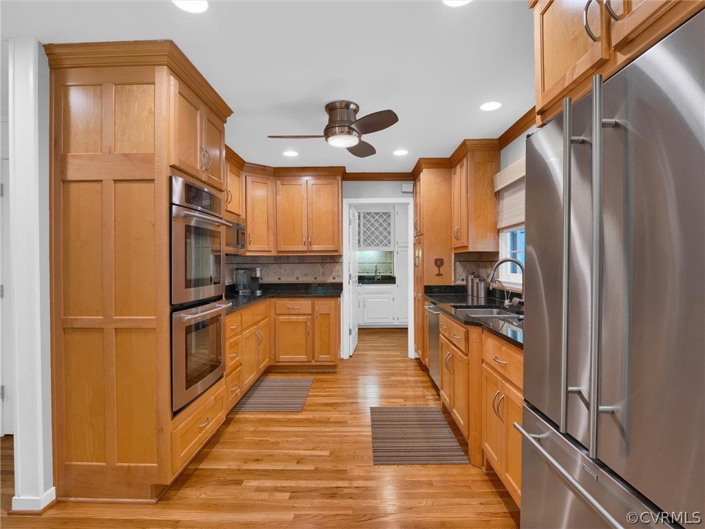 22341 Skinquarter Road Moseley, VA 23120 - Photo 24 of 50 a kitchen with stainless steel appliances a refrigerator and a stove top oven