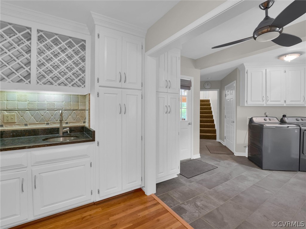 22341 Skinquarter Road Moseley, VA 23120 - Photo 26 of 50 a kitchen with granite countertop white cabinets and refrigerator