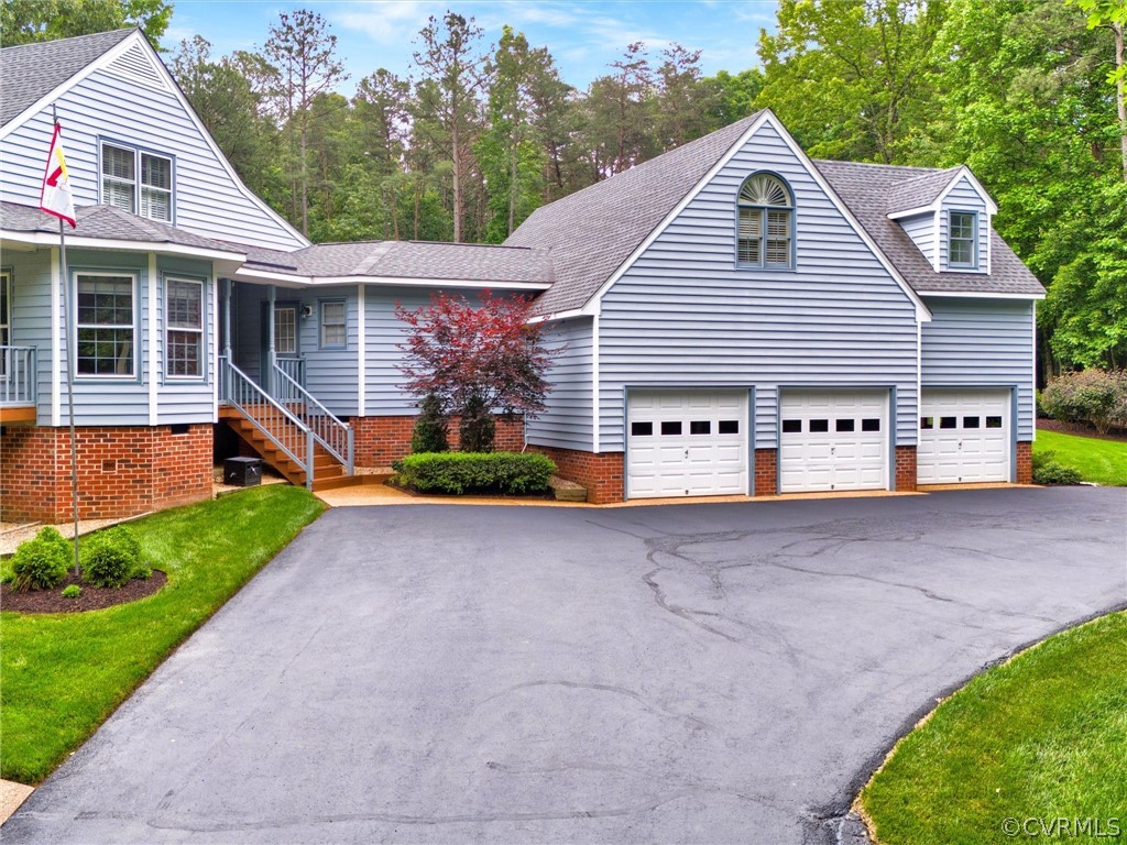 22341 Skinquarter Road Moseley, VA 23120 - Photo 4 of 50 a view of house with backyard and garden