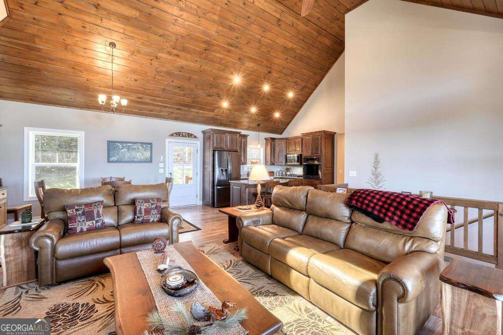 1309 Ridge Pointe Way, Unit 284 Blairsville, GA 30512 - Photo 14 of 75 a living room with furniture and a large window