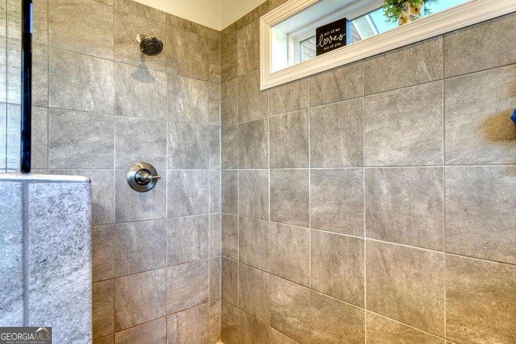 1309 Ridge Pointe Way, Unit 284 Blairsville, GA 30512 - Photo 27 of 75 a bathroom with a shower