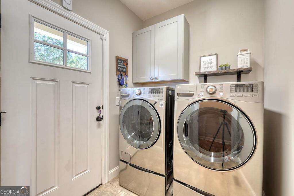 1309 Ridge Pointe Way, Unit 284 Blairsville, GA 30512 - Photo 32 of 75 a utility room with dryer and washer
