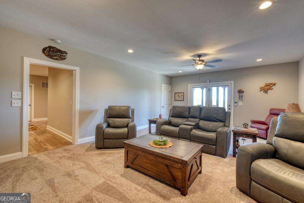 1309 Ridge Pointe Way, Unit 284 Blairsville, GA 30512 - Photo 36 of 75 a living room with furniture and a couch