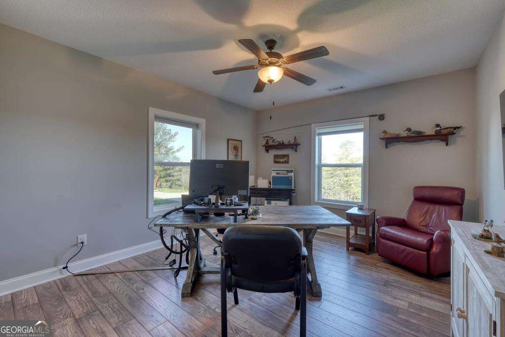 1309 Ridge Pointe Way, Unit 284 Blairsville, GA 30512 - Photo 41 of 75 a view of a dining room with furniture window and wooden floor