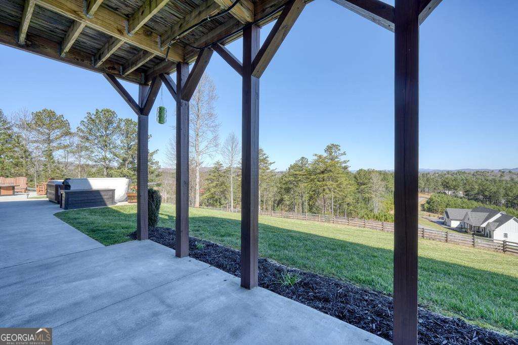 1309 Ridge Pointe Way, Unit 284 Blairsville, GA 30512 - Photo 50 of 75 a view of a porch with a yard