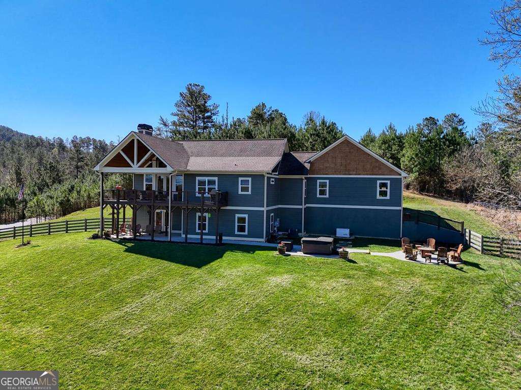 1309 Ridge Pointe Way, Unit 284 Blairsville, GA 30512 - Photo 5 of 75 a view of a house with a big yard