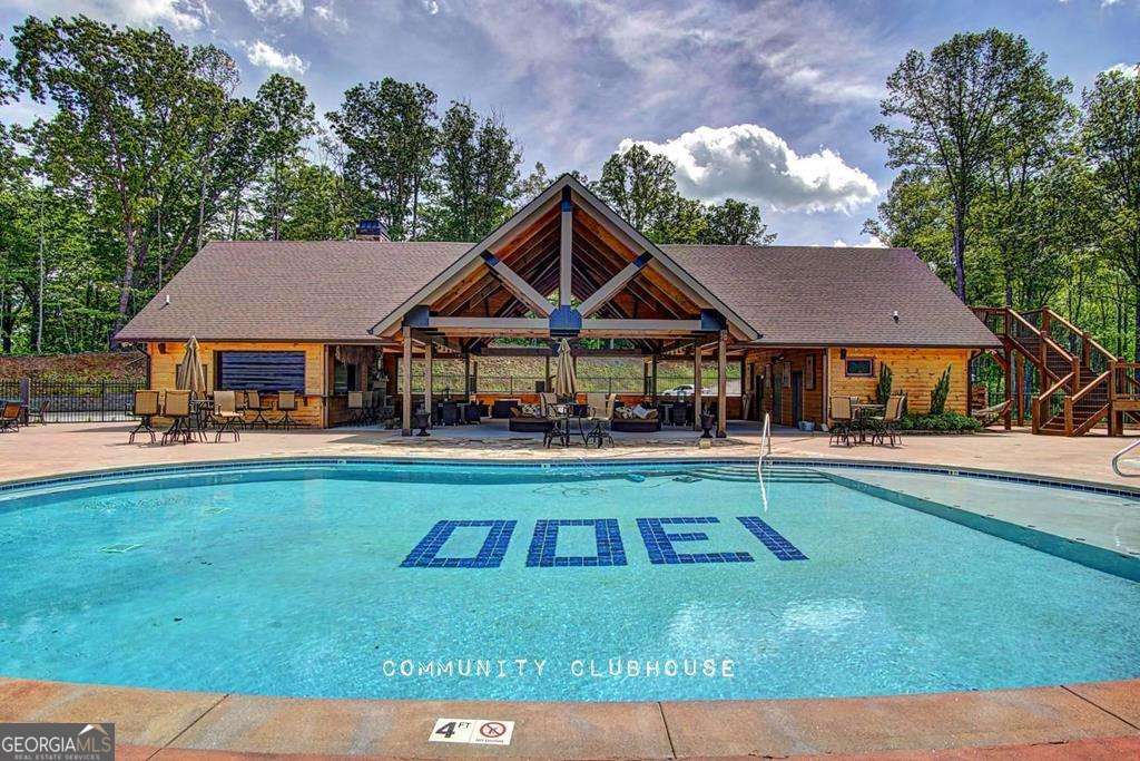 1309 Ridge Pointe Way, Unit 284 Blairsville, GA 30512 - Photo 67 of 75 a house view with a seating space and garden