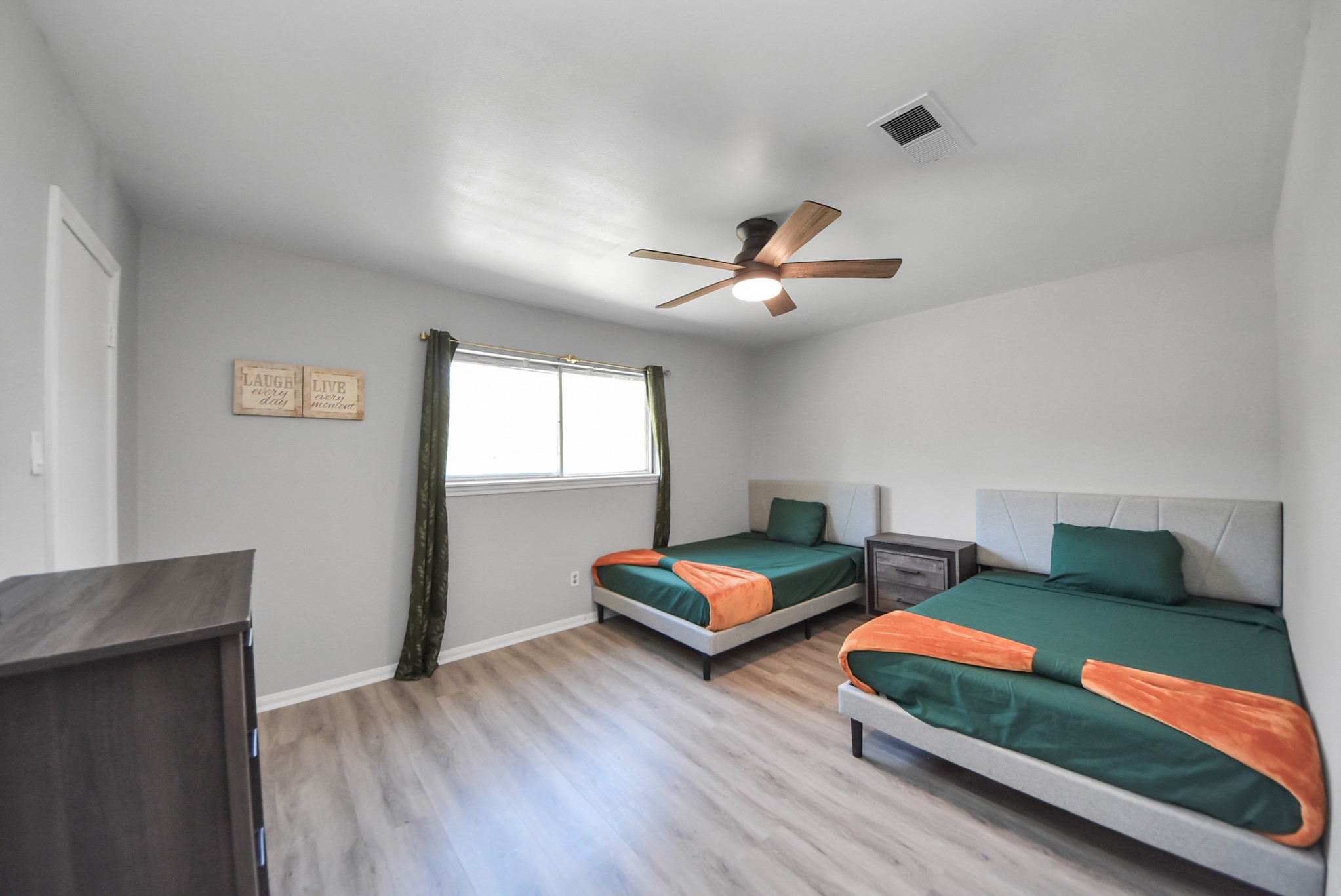 1011 Whitestone Lane Houston, TX 77073 - Photo 12 of 48 a bedroom with two beds and a lamp