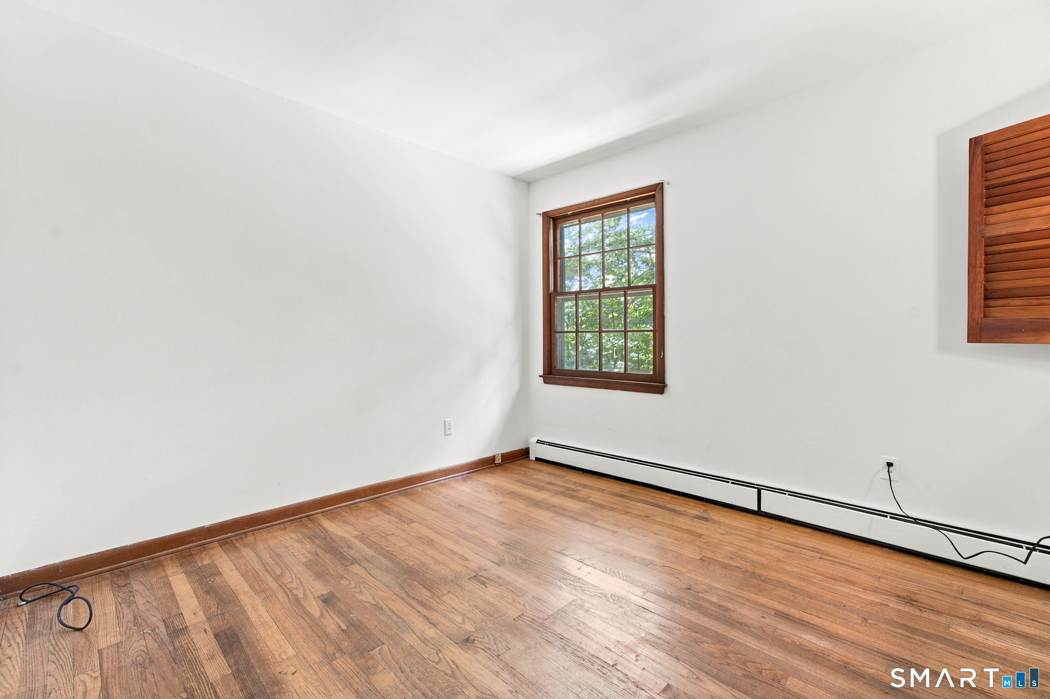 448 Mixville Road Cheshire, CT 06410 - Photo 18 of 32 an empty room with a window