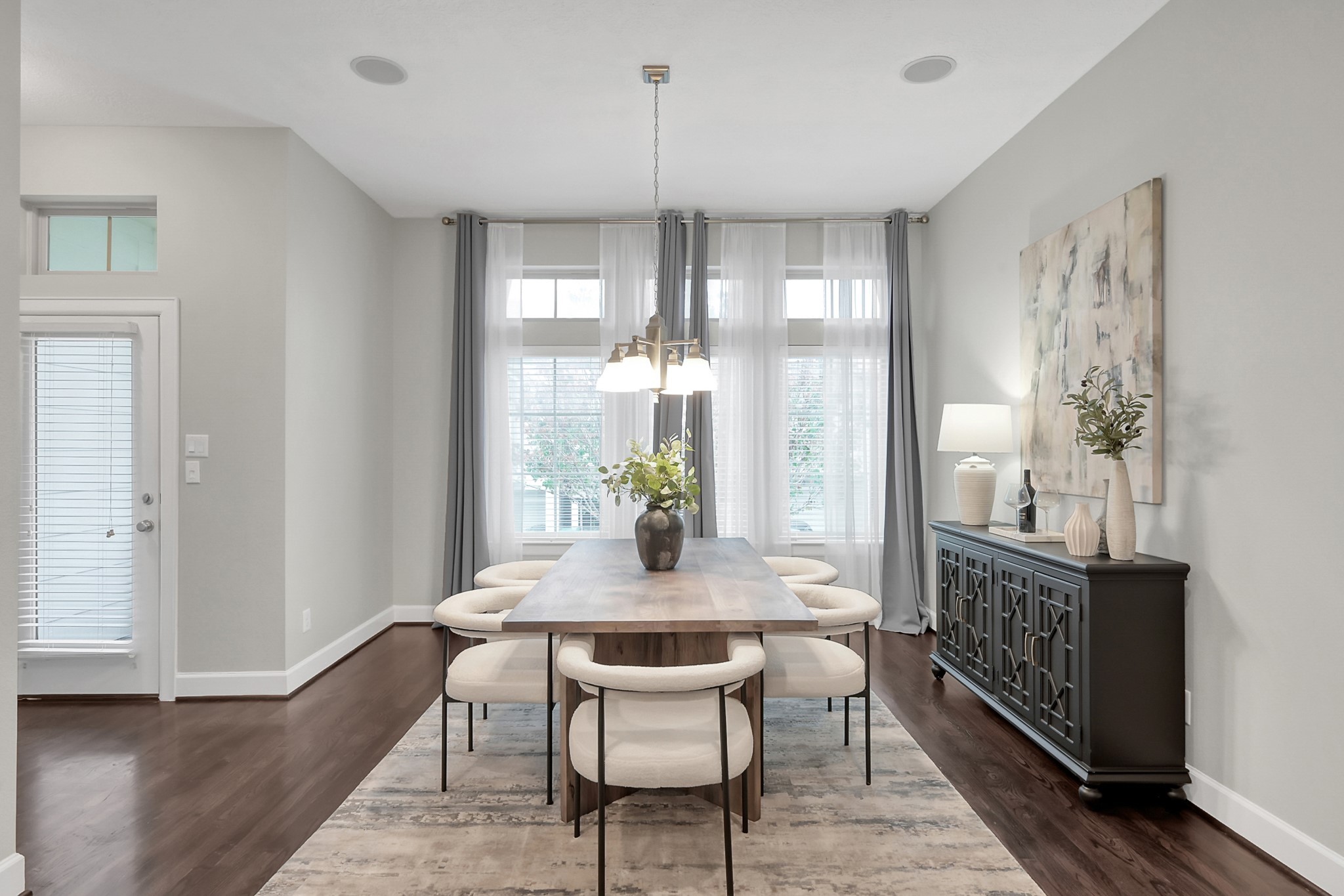 351 West 26th Street Houston, TX 77008 - Photo 18 of 45 This elegant dining room on second floor features the warm wood flooring complements the neutral wall tones, creating a welcoming atmosphere.