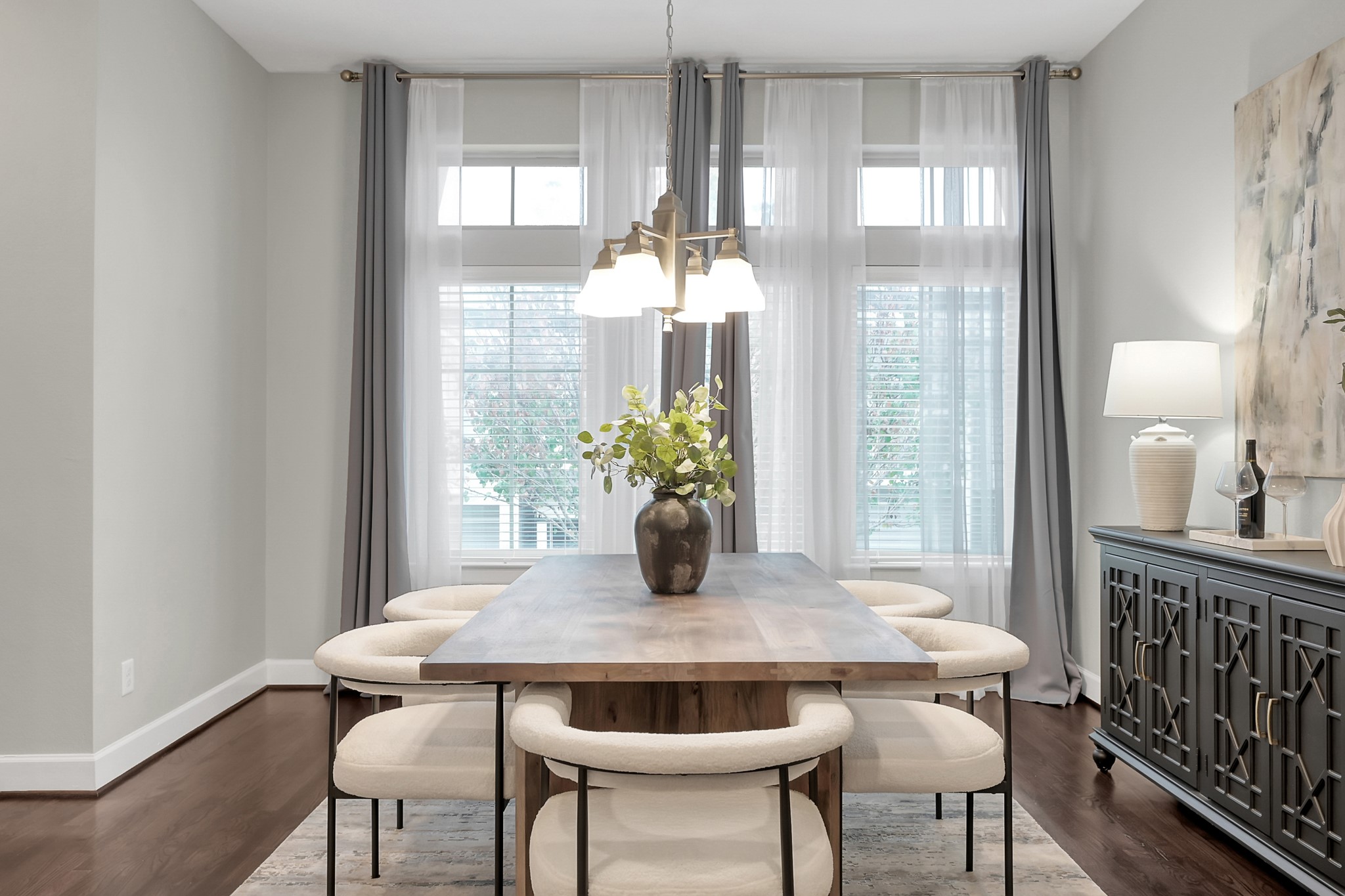 351 West 26th Street Houston, TX 77008 - Photo 21 of 45 The dining room is accented with neutral tones and a stylish chandelier.