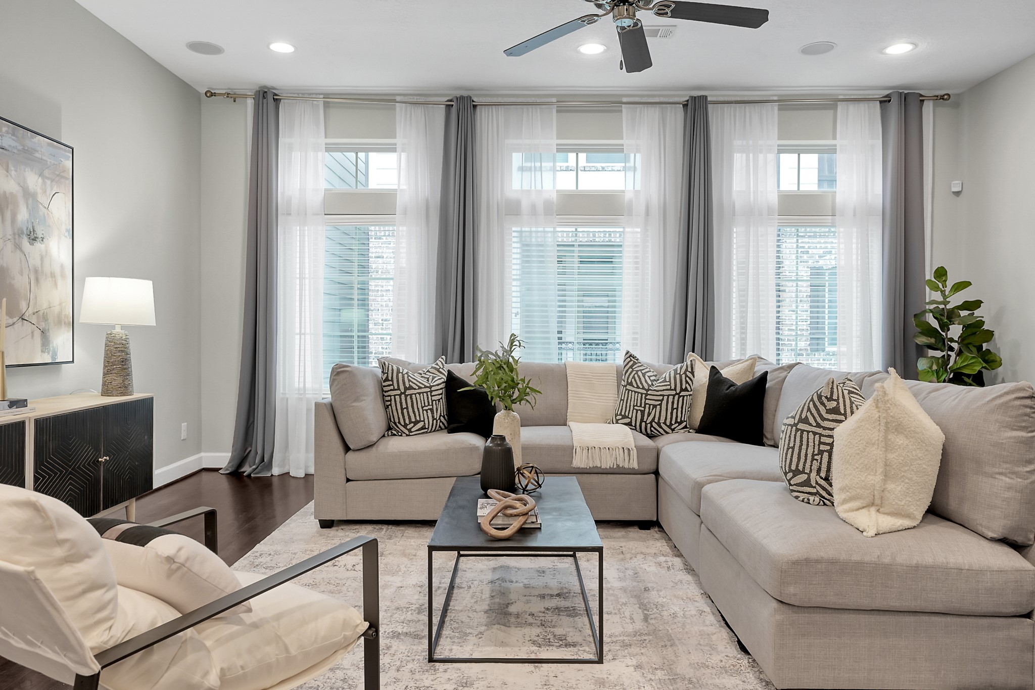 351 West 26th Street Houston, TX 77008 - Photo 3 of 45 Discover the perfect blend of style and comfort in this spacious living room, filled with abundant natural light and a welcoming atmosphere ideal for both relaxation and entertaining.