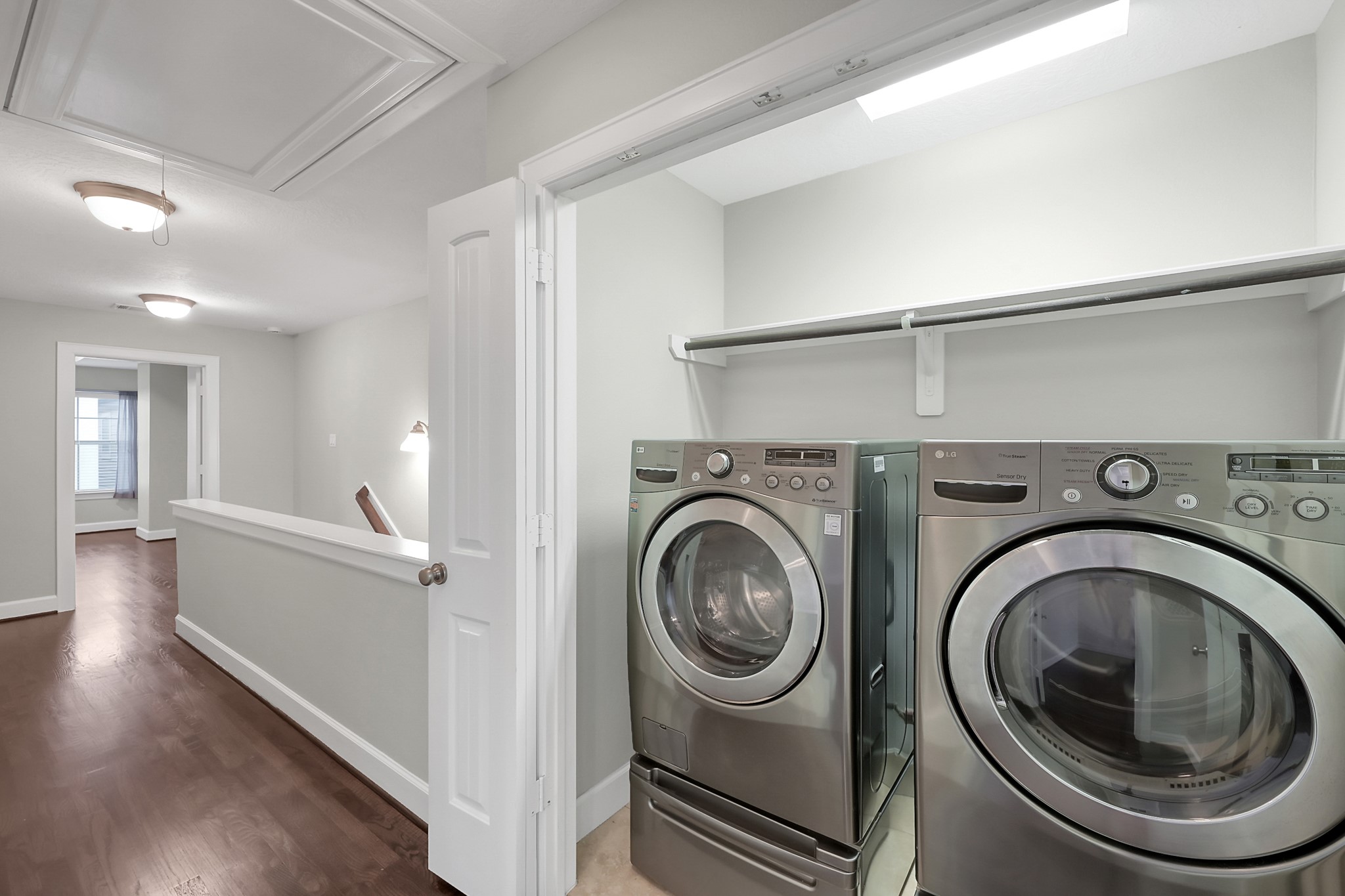 351 West 26th Street Houston, TX 77008 - Photo 36 of 45 This functional laundry room, conveniently located off the hallway, features modern appliances and ample shelving, making chores a breeze in your new home.