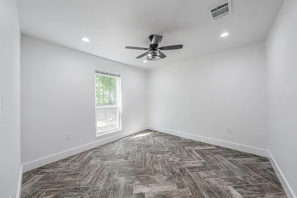 a view of an empty walk in closet