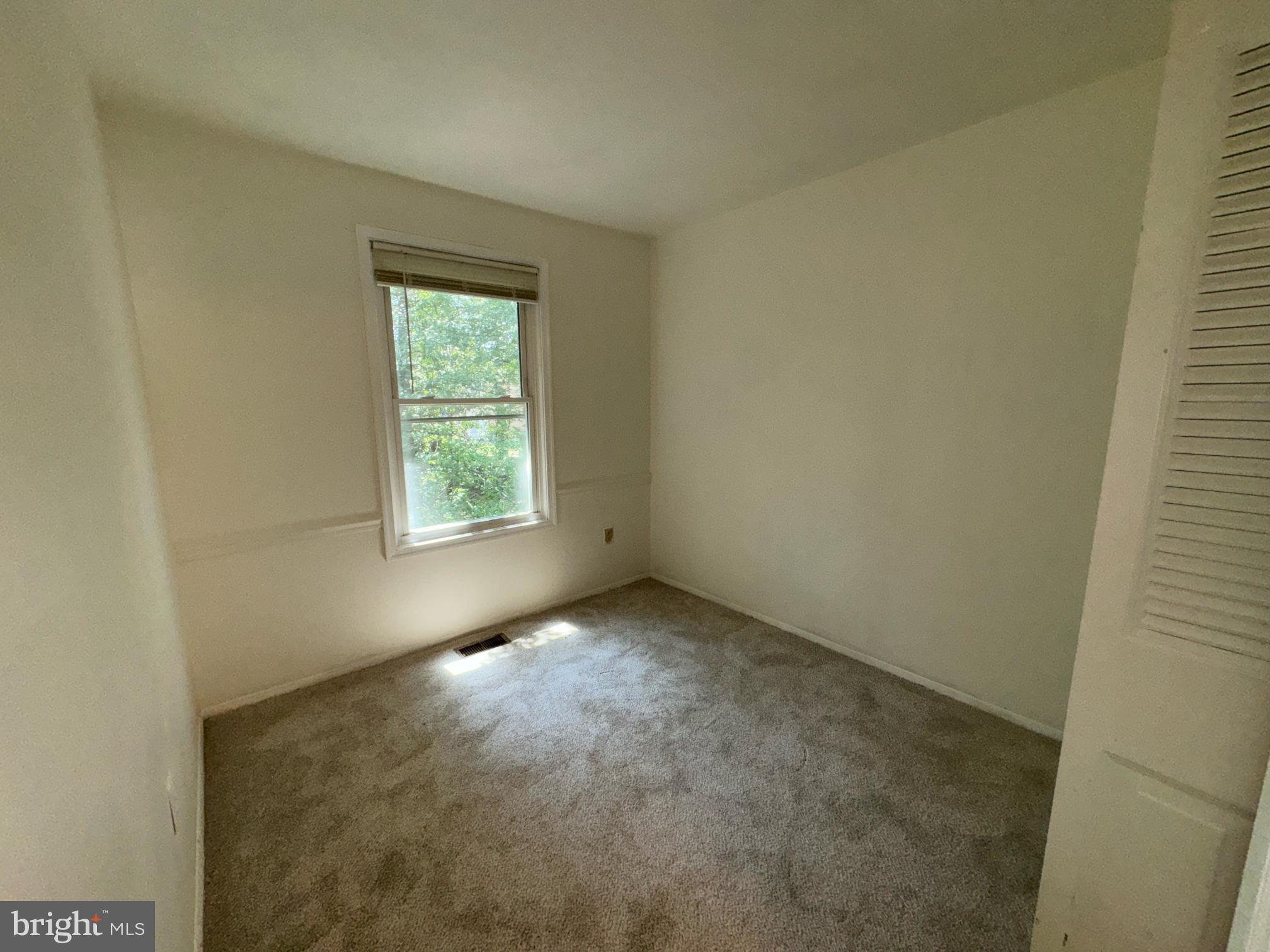 6113 Hil-Mar Drive District Heights, MD 20747 - Photo 12 of 15 an empty room with windows