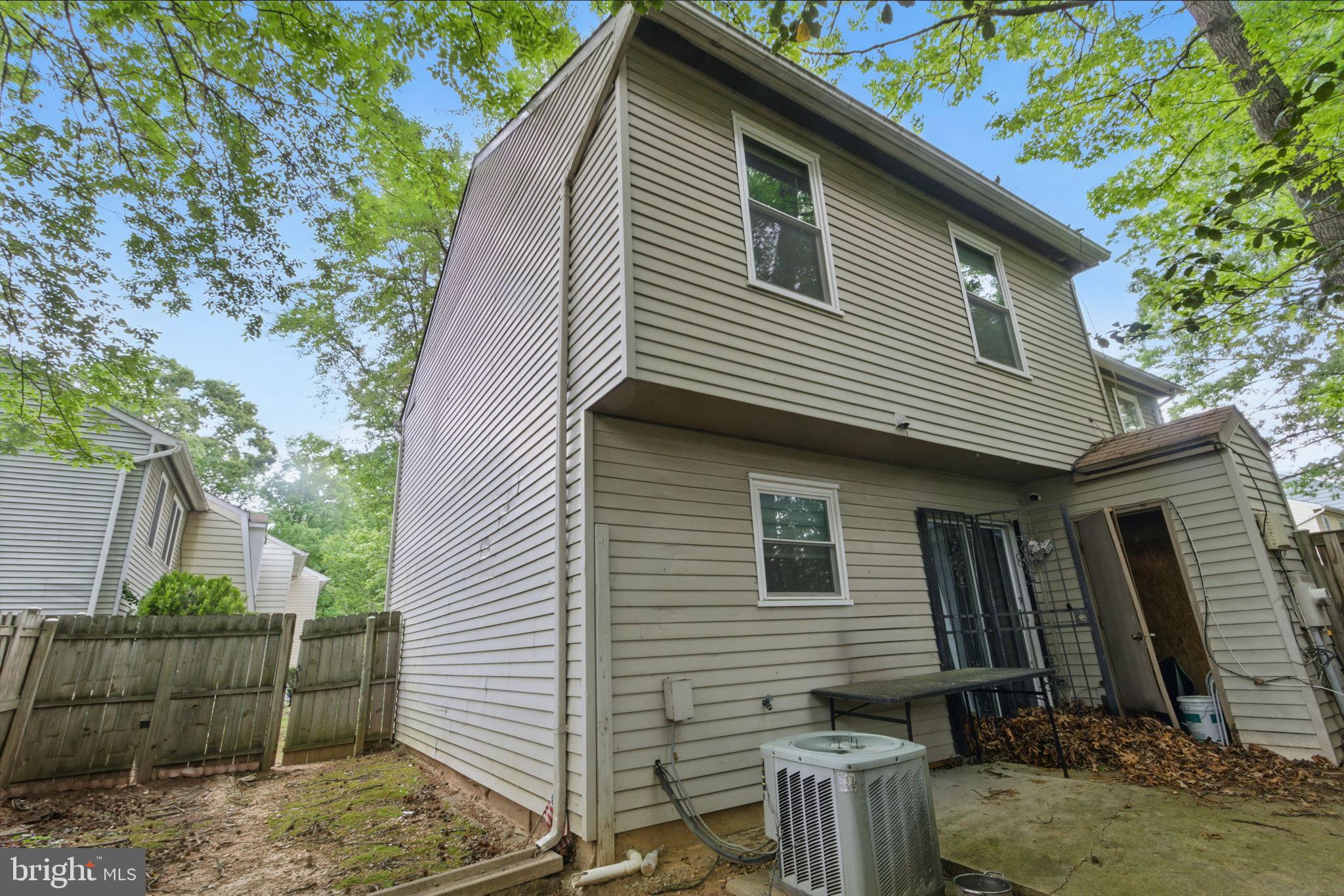 6113 Hil-Mar Drive District Heights, MD 20747 - Photo 15 of 15 a front view of a house with garden
