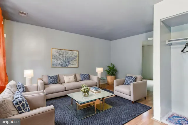 a living room with furniture and a couch