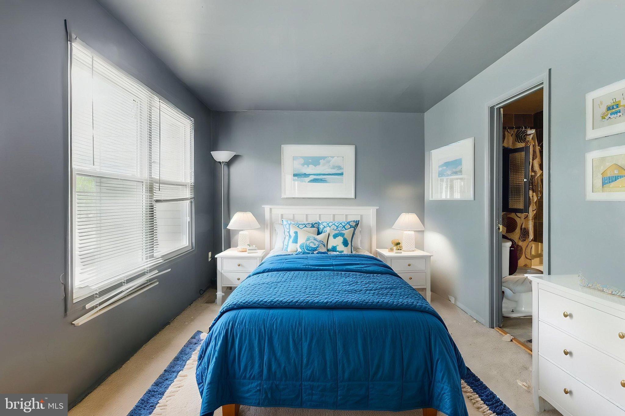 6113 Hil-Mar Drive District Heights, MD 20747 - Photo 9 of 15 a view of a bedroom with wooden floor and windows