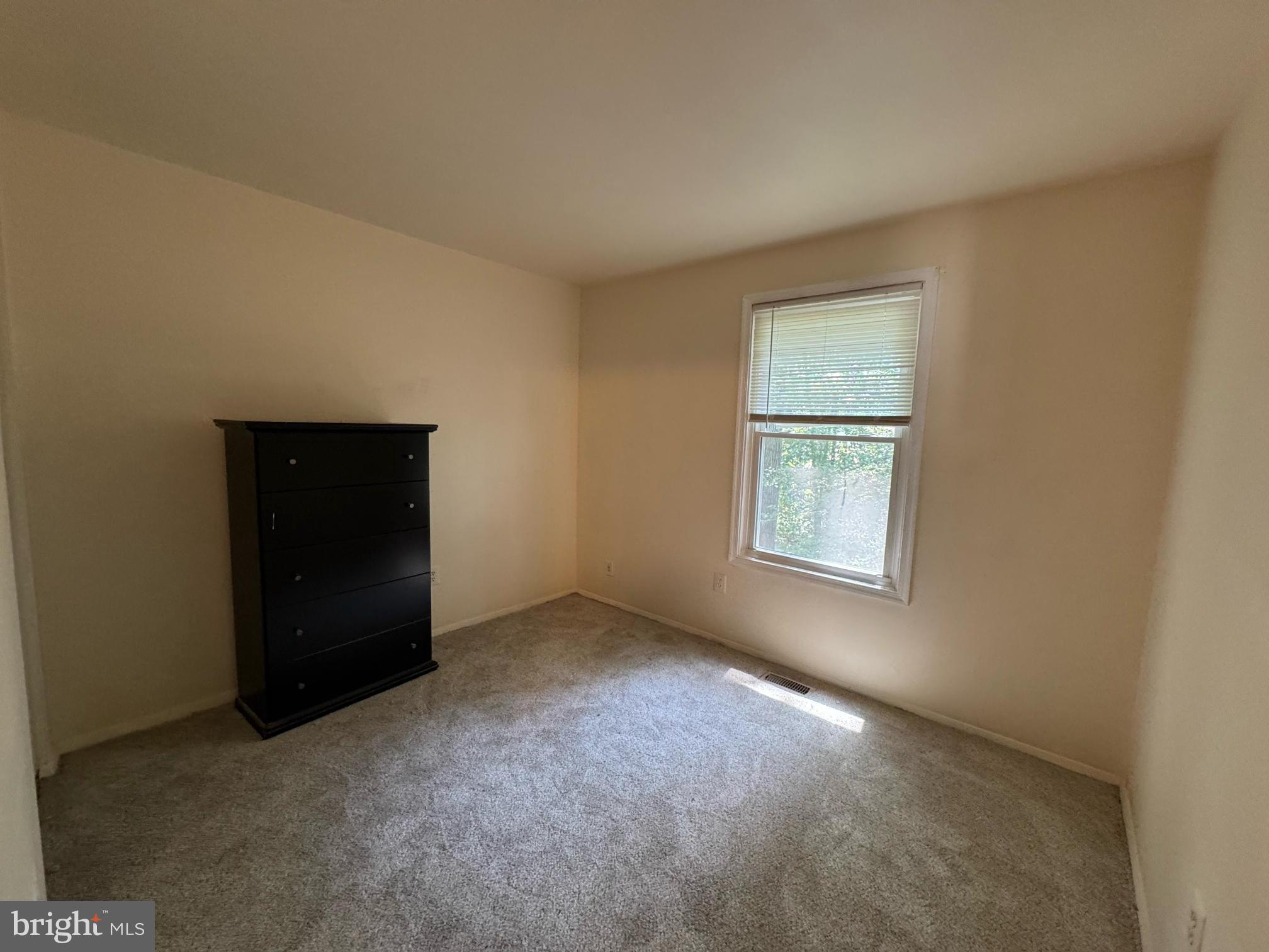 6113 Hil-Mar Drive District Heights, MD 20747 - Photo 10 of 15 an empty room with windows and closet