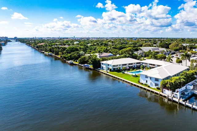 an aerial view of a house with a ocean view
