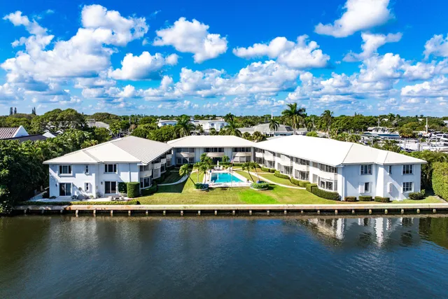 a view of a lake with a garden and lake view