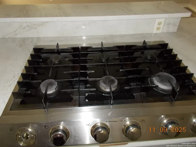 a bathroom with a sink vanity and a mirror