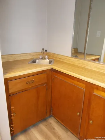 a view of a room with racks on the wall