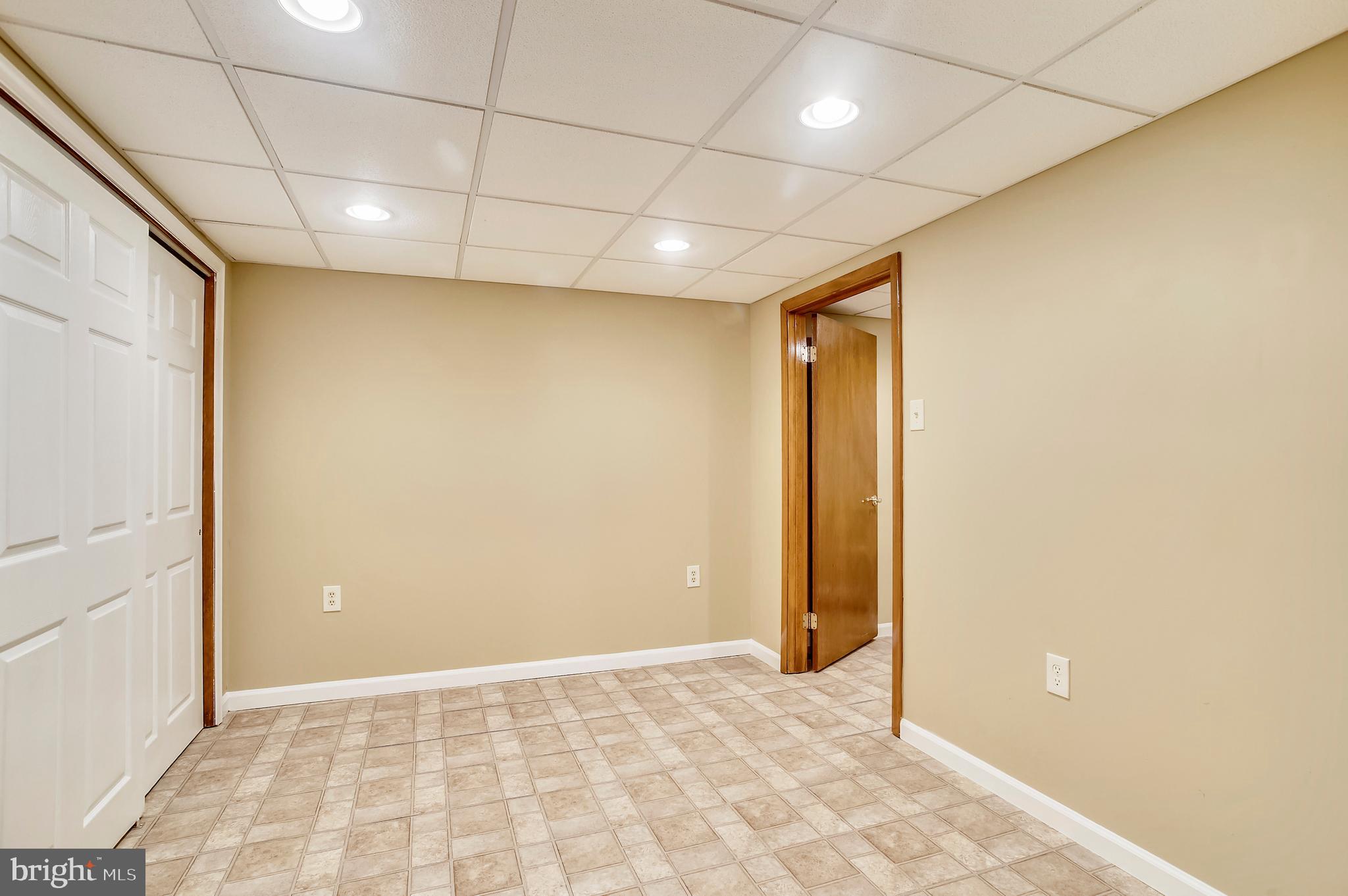 5633 Selford Road Baltimore, MD 21227 - Photo 23 of 44 Lower level family room