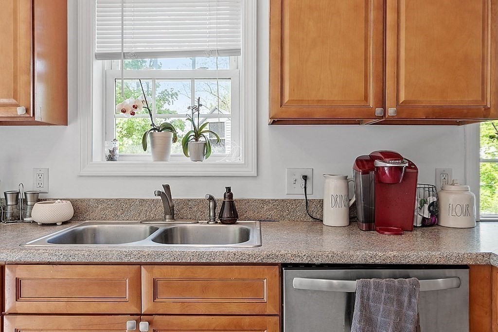 237 Spring Street Athol, MA 01331 - Photo 12 of 35 a kitchen with granite countertop a sink a window and cabinets